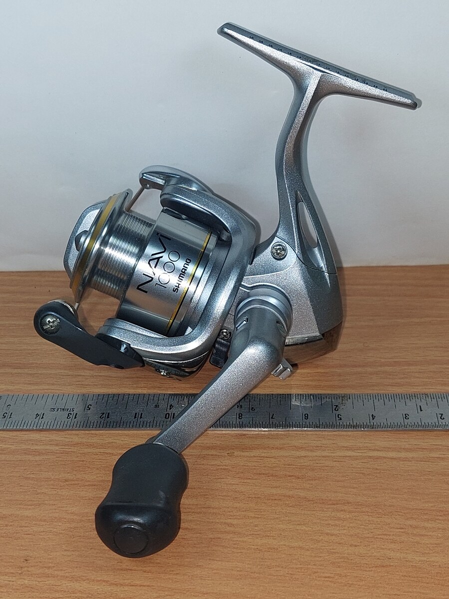   Dum fishing      REEL  #  4    ****  SHIMANO   NAVI  1000      ****