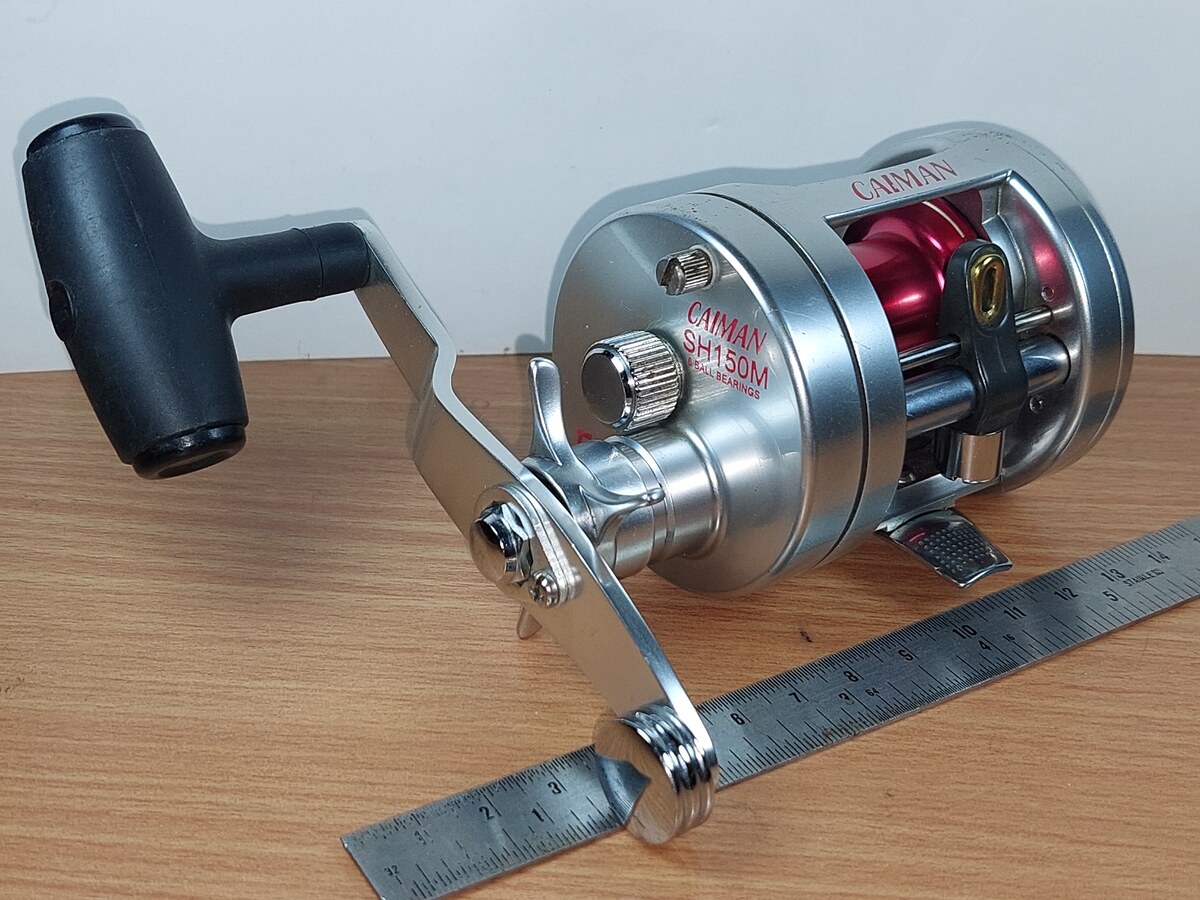   Dum fishing  REEL  #  5      *********  TICA   CAIMAN   SH 150 - M    ********