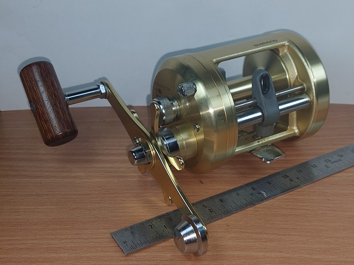   Dum fishing   REEL  #  6   ***   SHIMANO    CALCUTTA     1000    ***