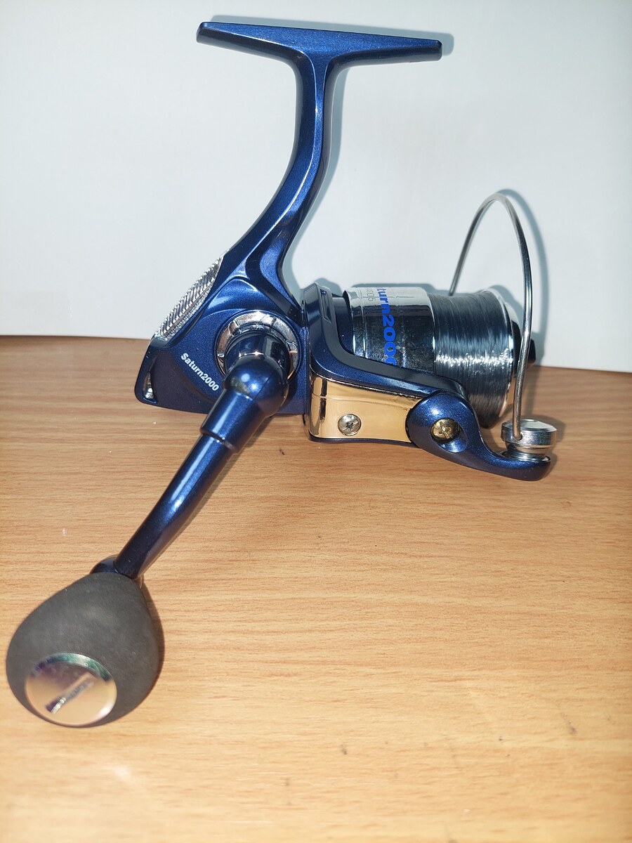   Dum fishing    #  1      **** รอกสปิน SATURN 2000 ****