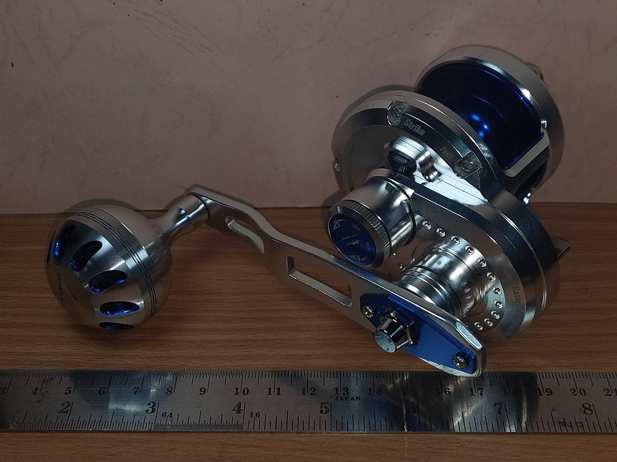   Dum fishing   REEL  # 1      **** GOMEXUS  LX 50    ****