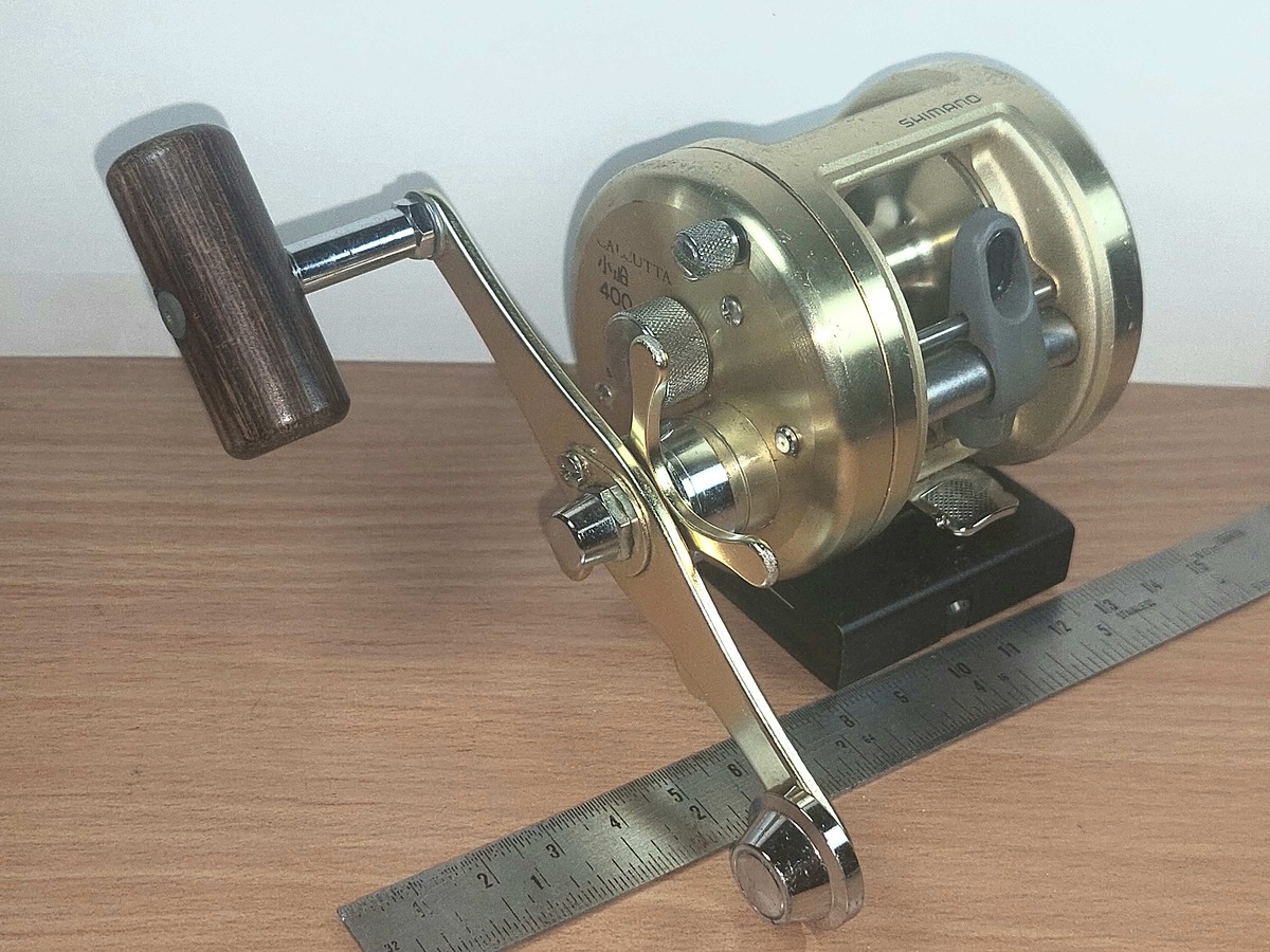   Dum fishing  # 7  ****   SHIMANO  CALCUTTA    400  ****