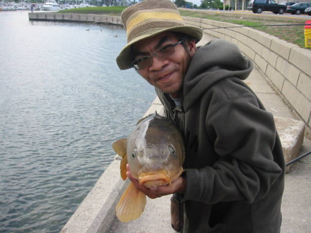 me and another fat carp.. 
all fish are catch and release..  :cheer: