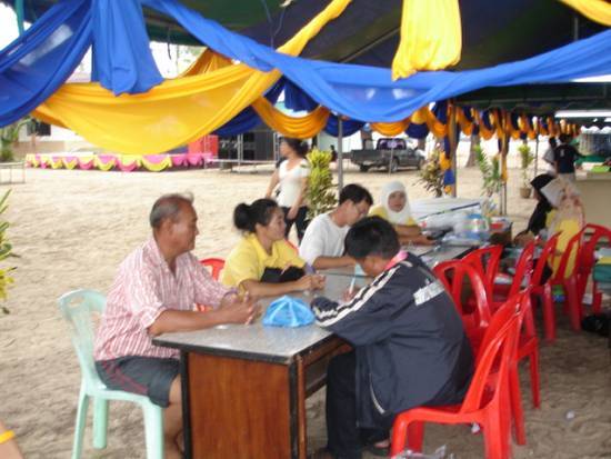 บรรยากาศที่นักกีฬาทะยอยกันมาลงทะเบียน