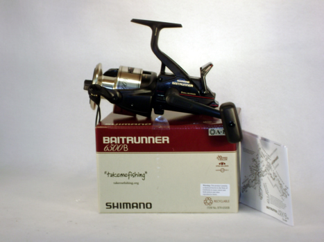 [b]SHIMANO BAITRUNNER 6500 B[/b]

    *  Gear Ratio: 4.2:1
    * Weight: 31.0oz
    * Line Capac