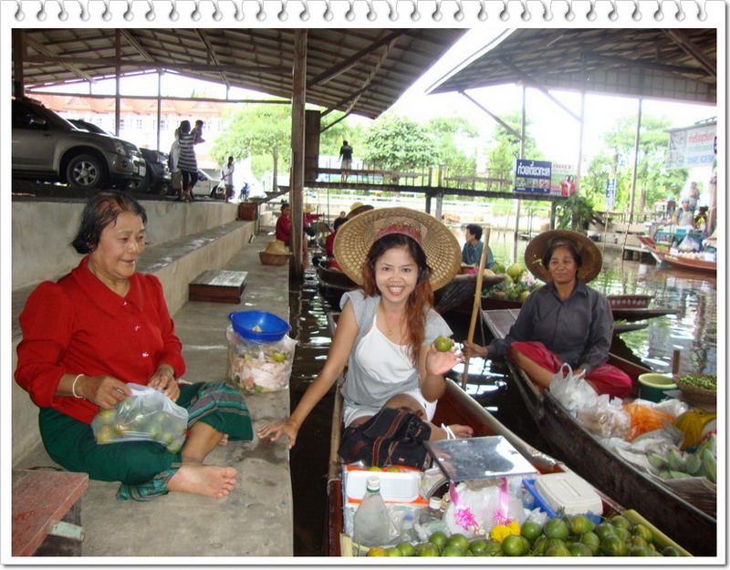 ลากันด้วยภาพแม่ค้าขายส้ม ที่ตลาดน้