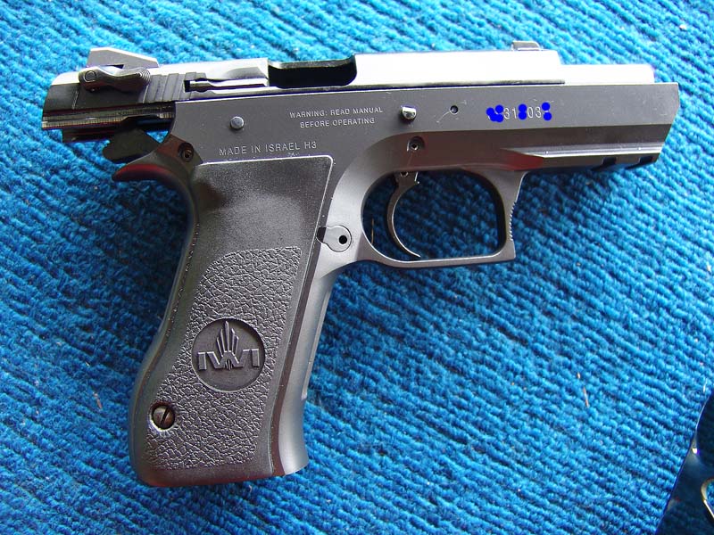 Israel Weapon Industries   UZI  Shortslide 9 mm.  :grin: