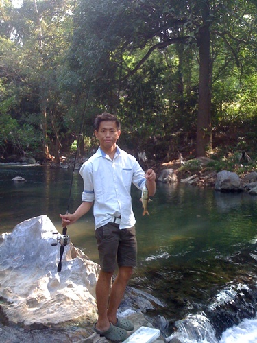 ถ่ายรูปยิ้มมั่งก็ได้พี่ :laughing: