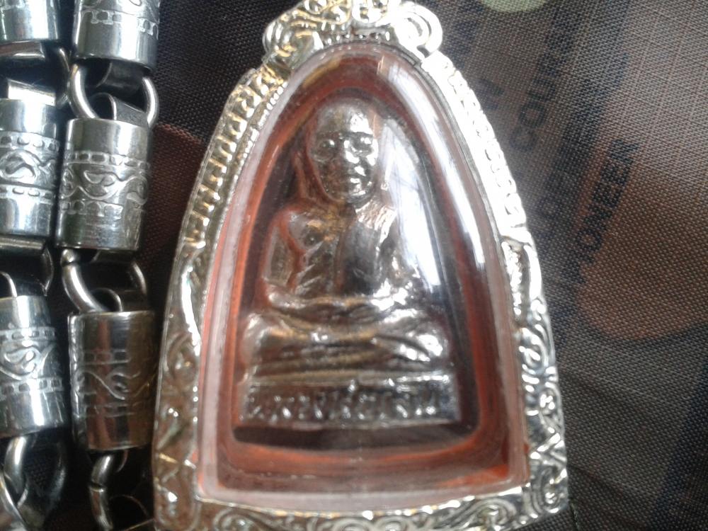 หลวงพ่อเงินวัดท้ายน้ำพิมพ์หน้าหนุ่มฐานสูงชุบนิกเกิ้ลปี15สวยหายากครับ