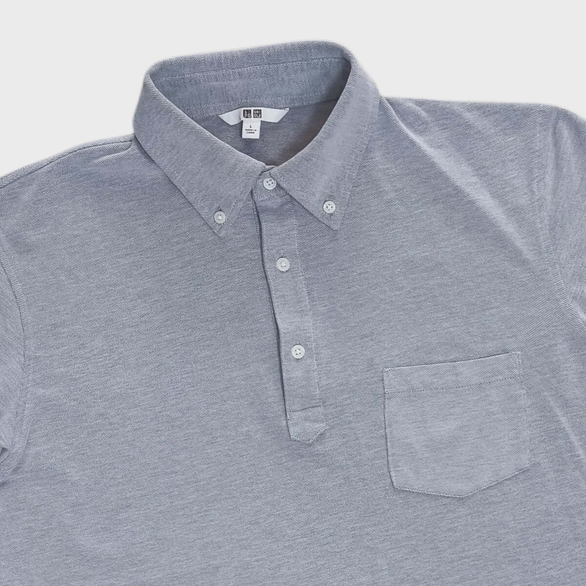 Uniqlo เสื้อยืดผ้าบาง โปโลสีเทาใหม่มาก  อก 44 นิ้ว