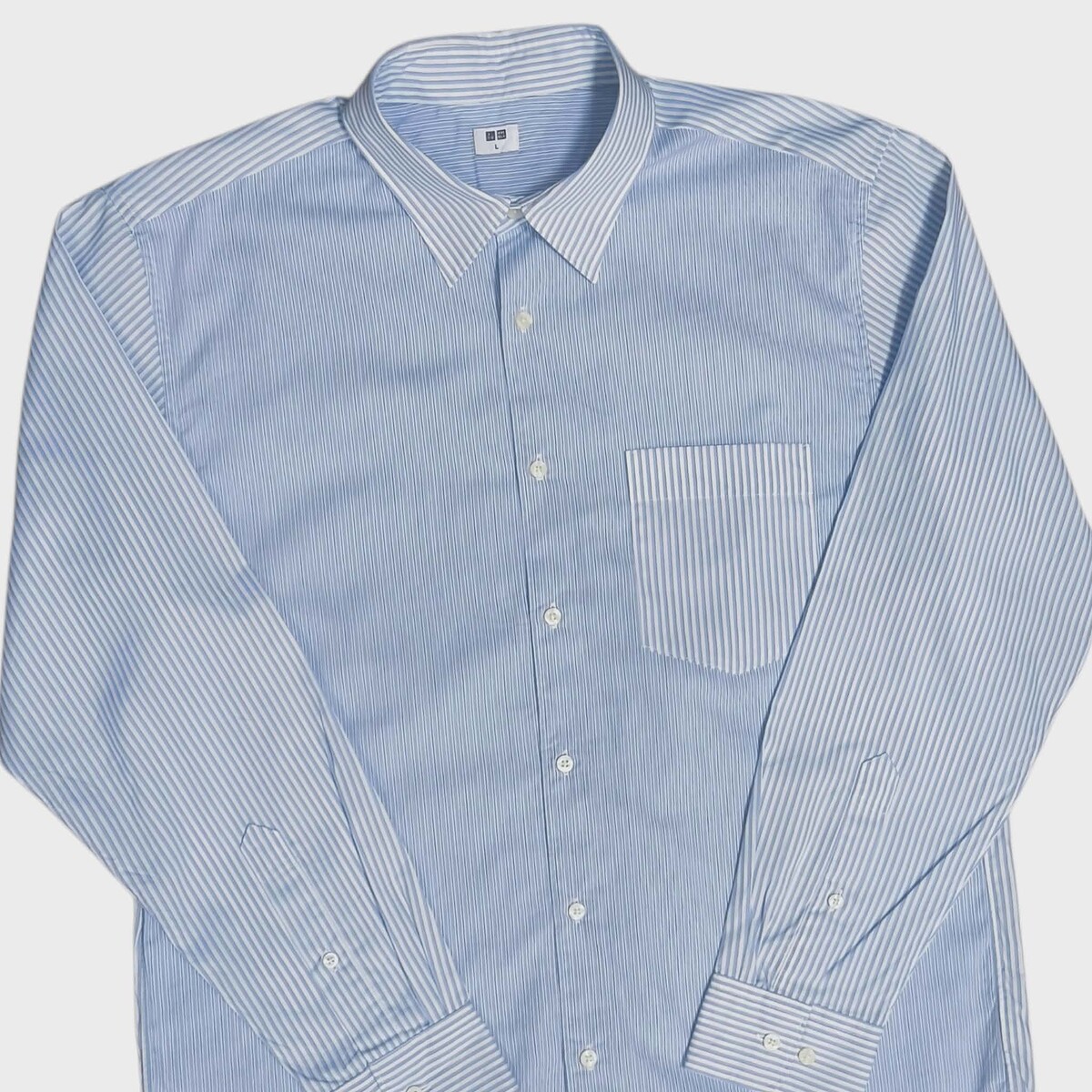 Uniqlo เชิ๊ตแขนยาว ของใหม่ สติ๊กเกอร์ยังอยู่ สวยๆครับ