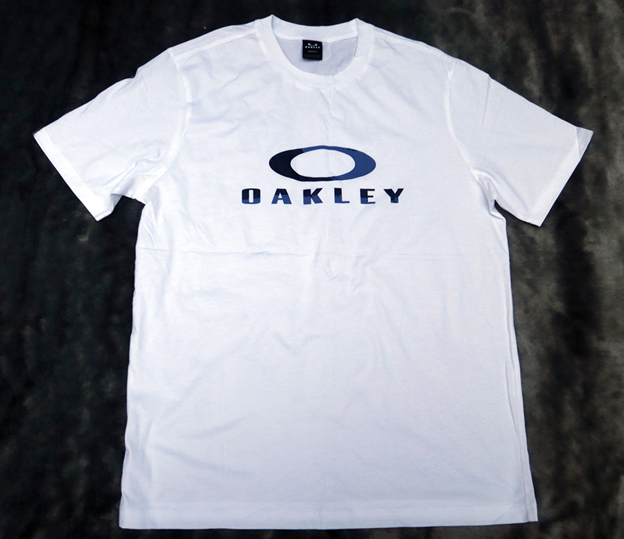 OAKLEY /44/46 เสื้อยืดคอกลมแขนสั้นสีขาวสวยใหม่แท้หลุดโรงงาน รวมส่ง Flash